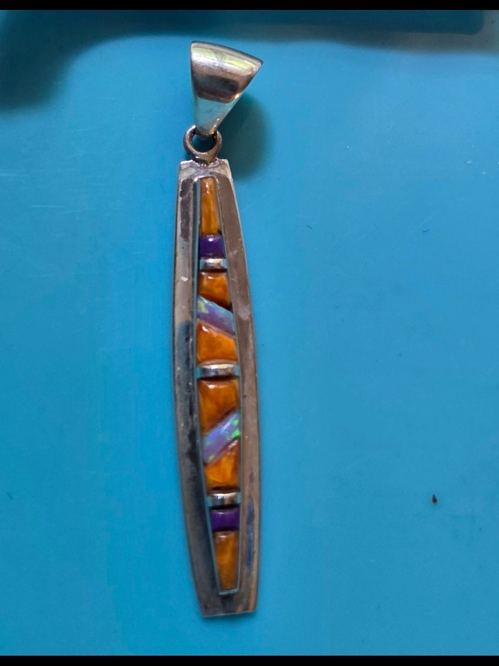 Sterling Silver Inlay Pendant with Orange and Purple Accents